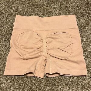 Blush pink scrunch butt athletic shorts. SHEIN.